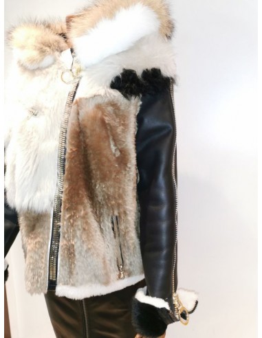 Chaqueta de piel vuelta con capucha de pelo