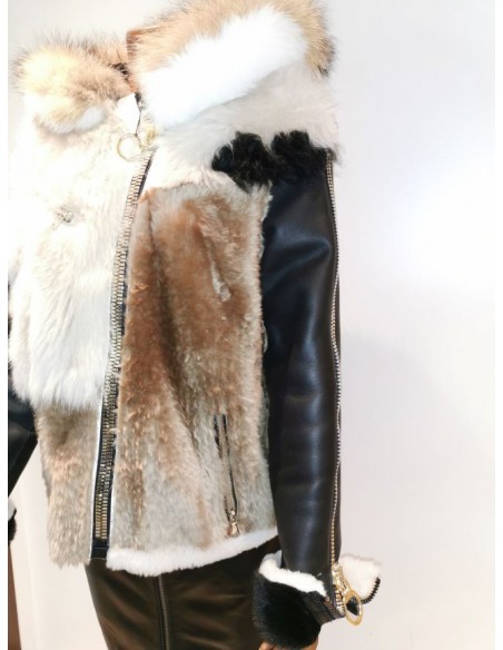 Chaqueta de piel vuelta con capucha de pelo